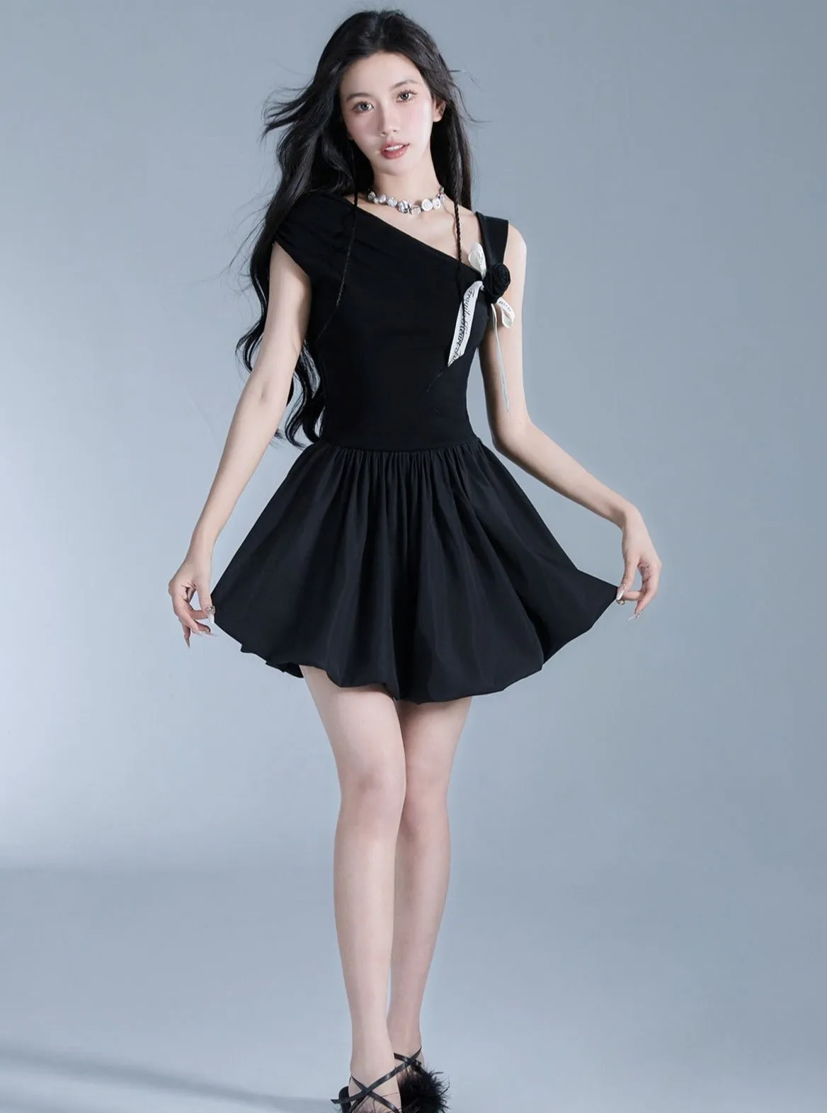 Elegant Off-Shoulder Black Mini Dress with Contrast Bow Detail